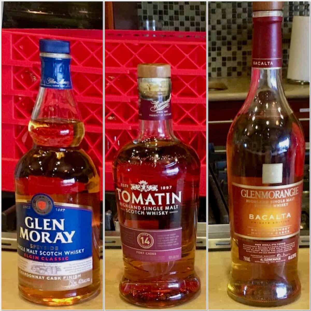 Collage of Glen Moray, Tomatin, and Glenmorangie scotch bottles on a counter.