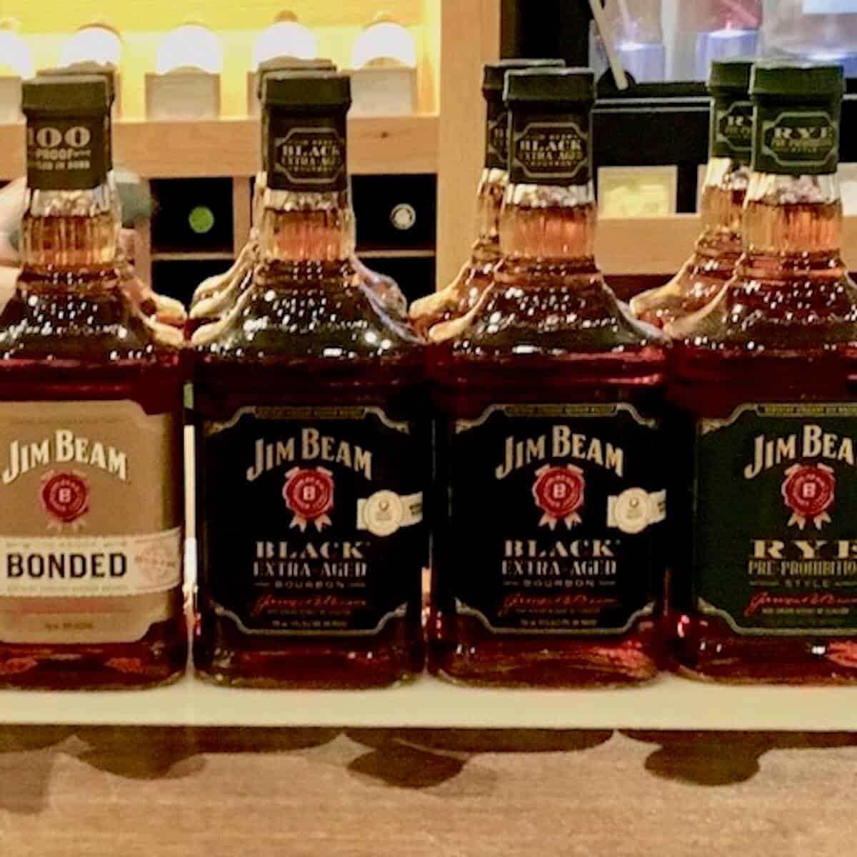 Jim Beam bottles lineup on a counter.