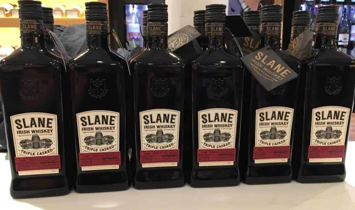 Slane Irish Whiskey bottles on a counter.