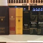 Glenmorangie and Ardbeg lineup in boxes on a counter.