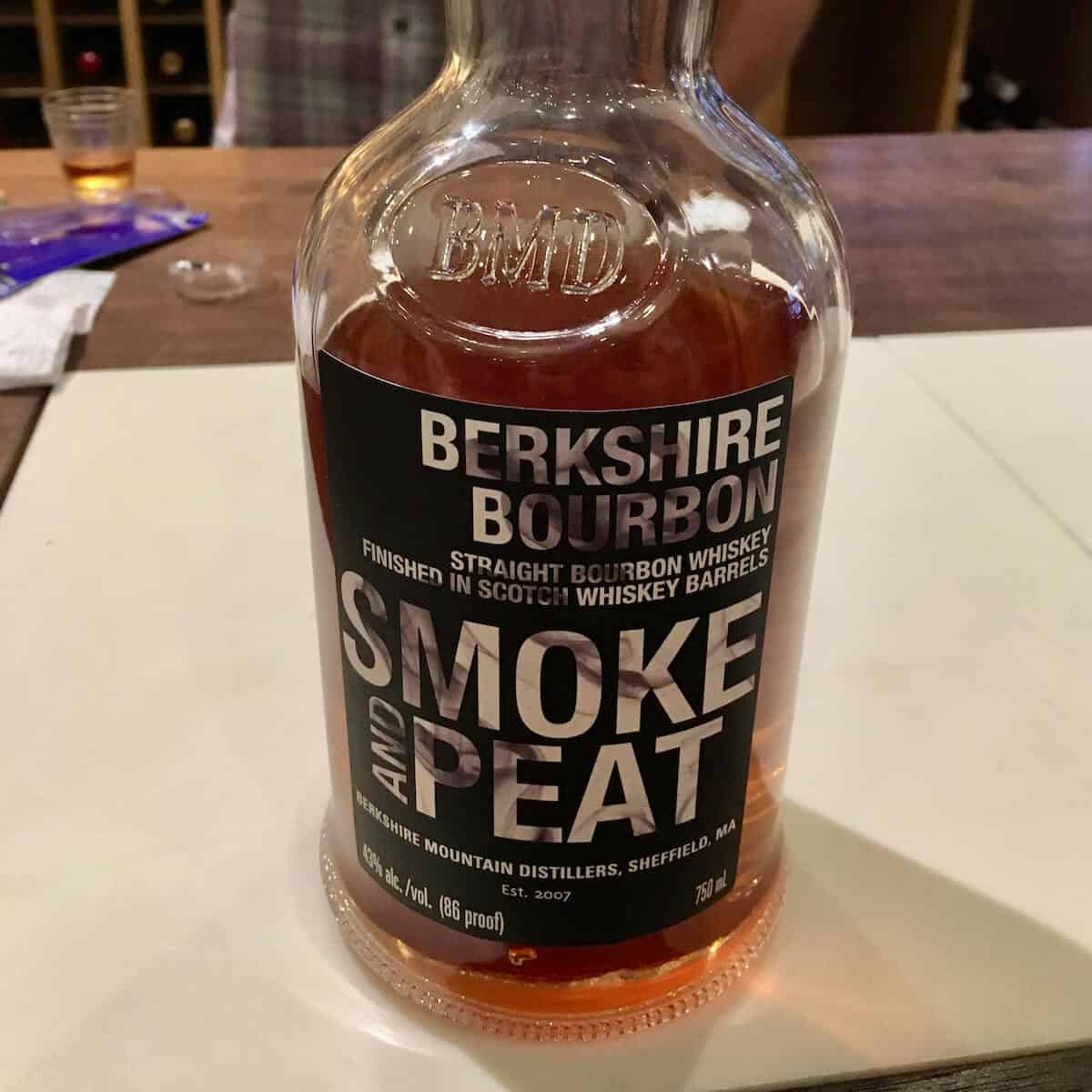 Berkshire Bourbon Smoke & Peat bottle on a counter.