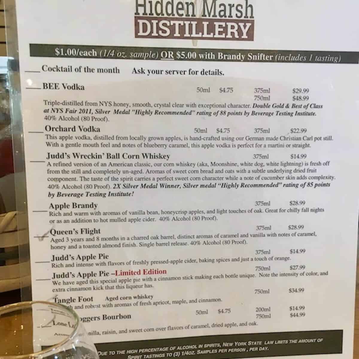 Hidden Marsh Distillery tasting room menu printout.