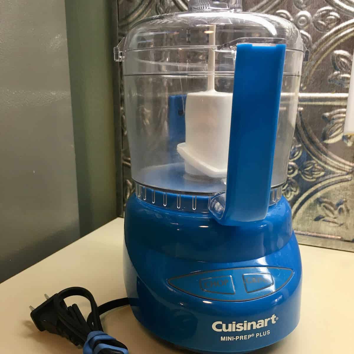 Cuisinart Mini Prep Plus Food Processor on a counter.