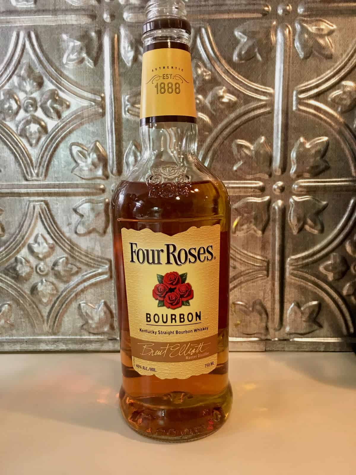 Four Roses Kentucky Straight Bourbon Whiskey on a counter.