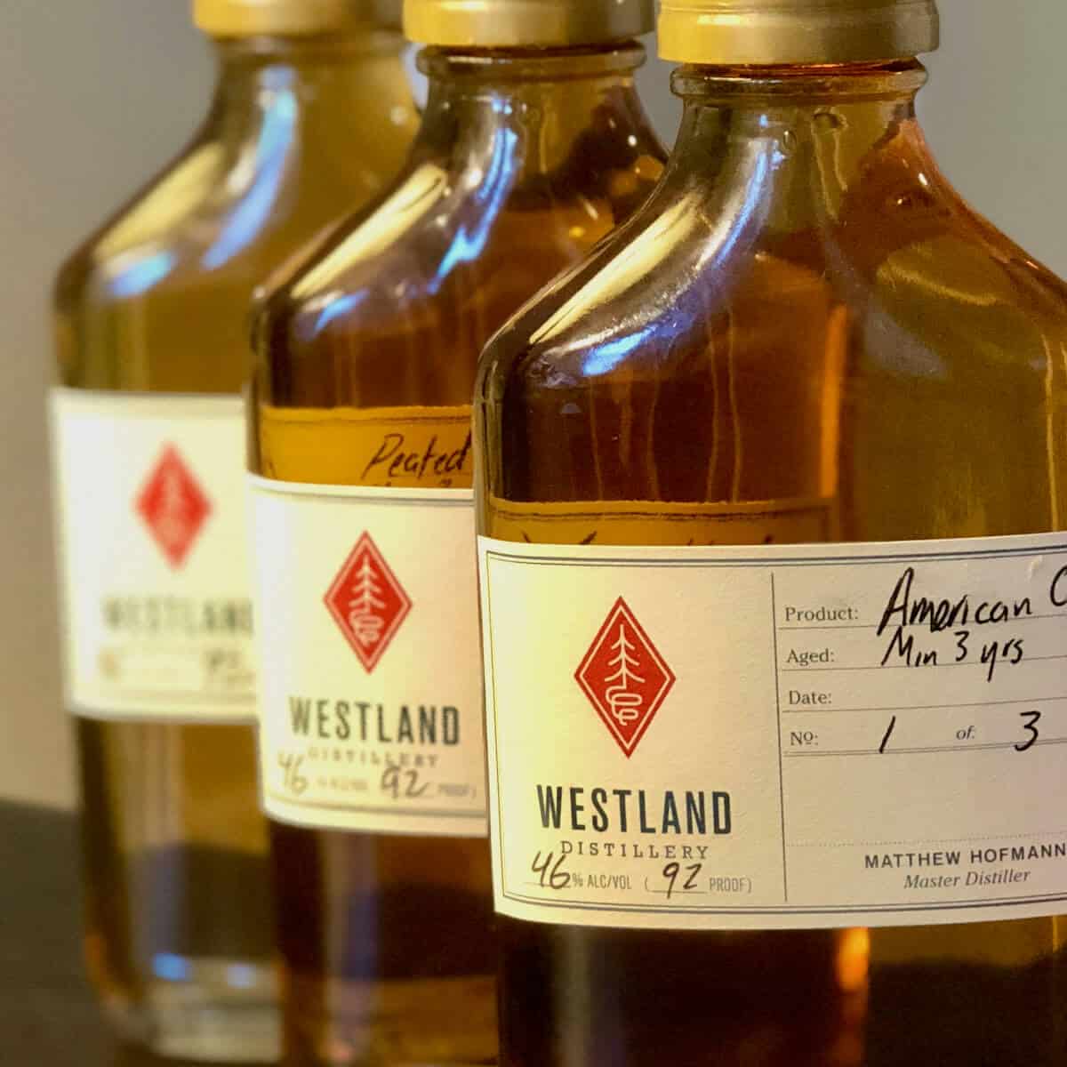 Westland American Single Malt sample bottle lineup on a table.