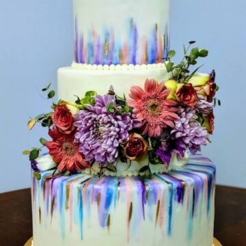 Wedding cake decorated with flowers.