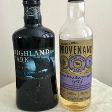 Highland Park Voyage of the Raven and Douglas Laing Provenance in bottles on a table.