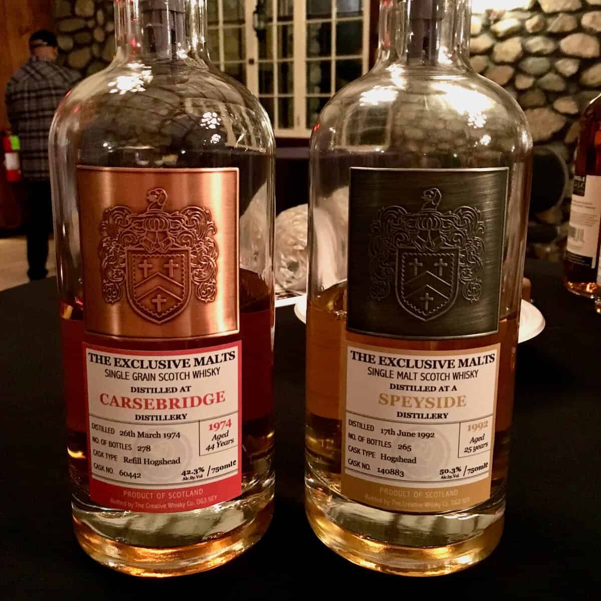 Exclusive Malts Carnebridge & Speyside bottles on a table.