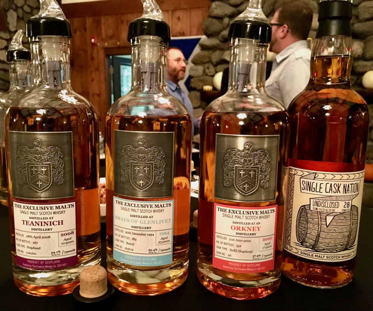 Exclusive Malts Teaninich, Braeval, Orkney, & SCN Undisclosed bottles on a table.