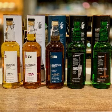 AnCnoc lineup in bottles on a counter.