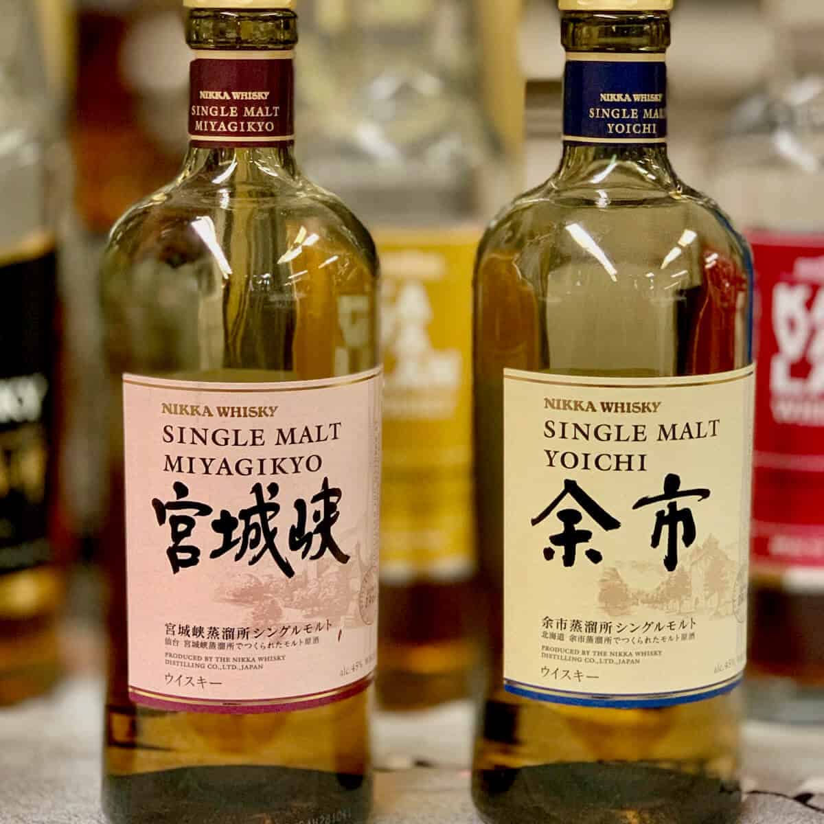 Nikka Single Malt Miyagikyo & YoIchi in bottles whisky on a table.