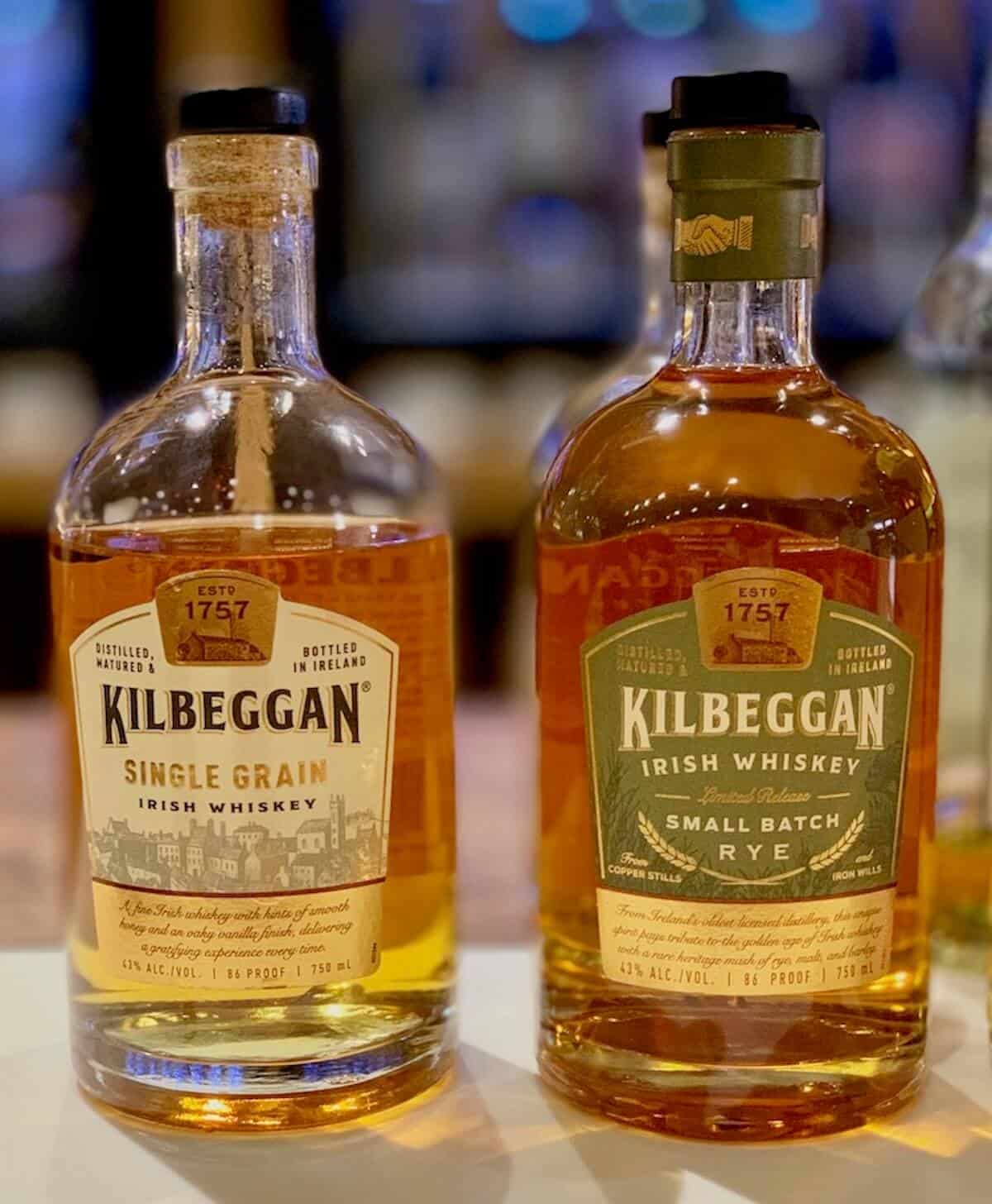 Kilbeggan Irish Whiskey in bottles on a counter.