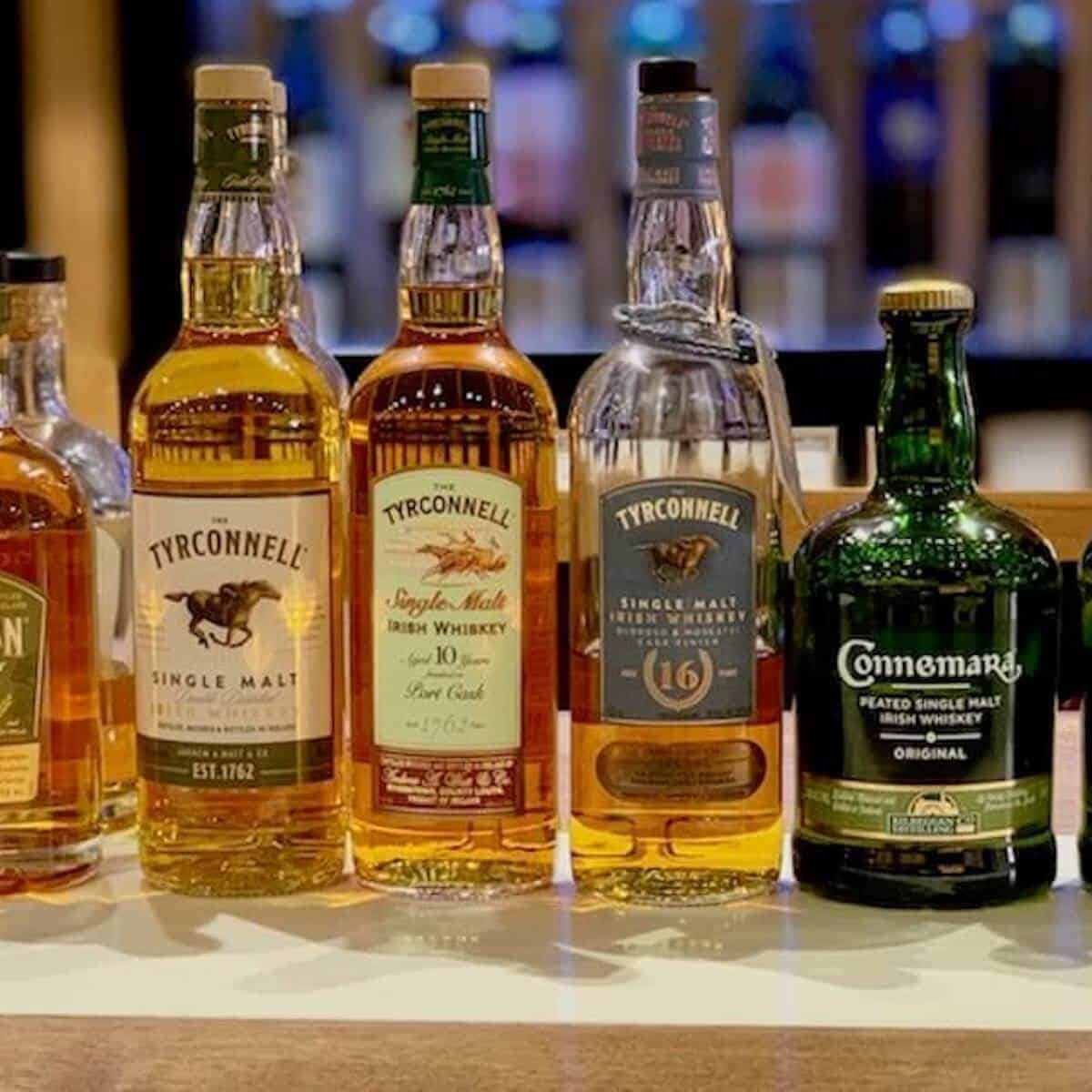 Kilbeggan Irish Whiskey selections in bottles on a counter.