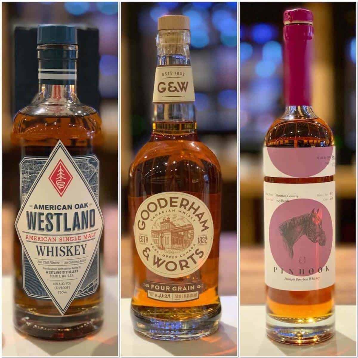 Collage of Westland, Gooderham & Wort, and Pinhook whiskey bottles on a counter.