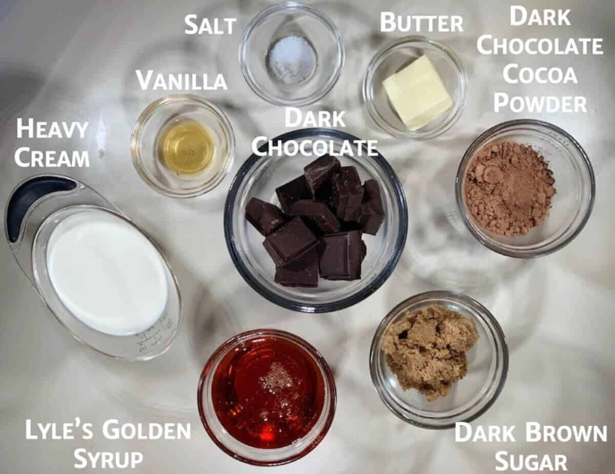 Hot fudge sauce ingredients portioned into glass bowls.