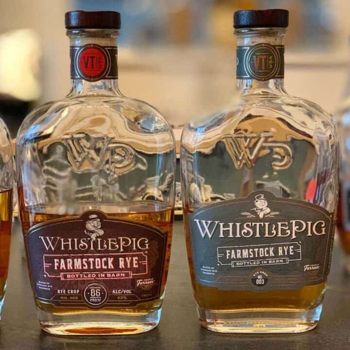 WhistlePig Rye Farmstock Crop Whiskeys on a counter.