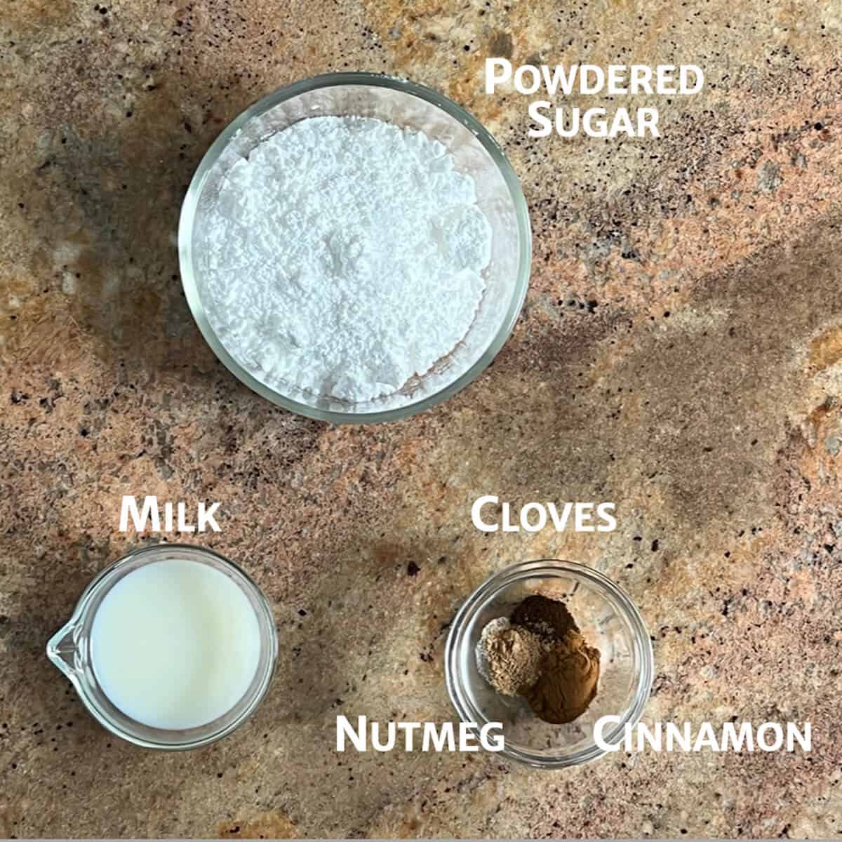 Pumpkin Spice glaze ingredients portioned into glass bowls.