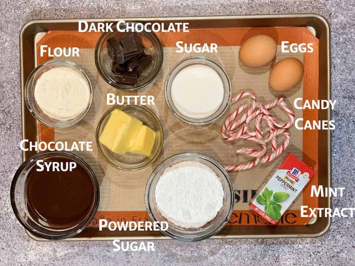 Double Chocolate Peppermint Brownies ingredients portioned in glass bowls on a baking pan.