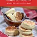 Three Sourdough English Muffins stacked with more in wooden bowl behind Pinterest banner..