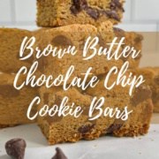 Chocolate Chip Cookie Bars stacked on a counter Pinterest banner.