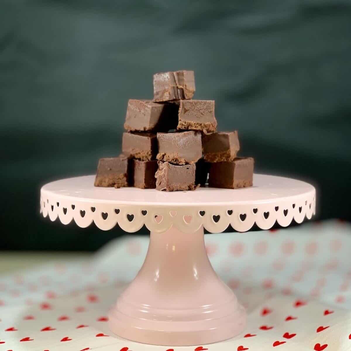 Kahlua Fudge stacked on a pink cake stand.