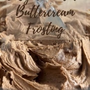 Bowl of dark chocolate buttercream frosting with an offset spatula sticking out Pinterest banner.