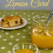 Lemon curd in a bowl and jar next to a scone on a white plate Pinterest banner.