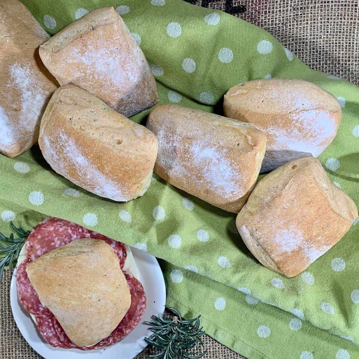 Herb Sourdough Ciabatta Rolls with sandwich overhead