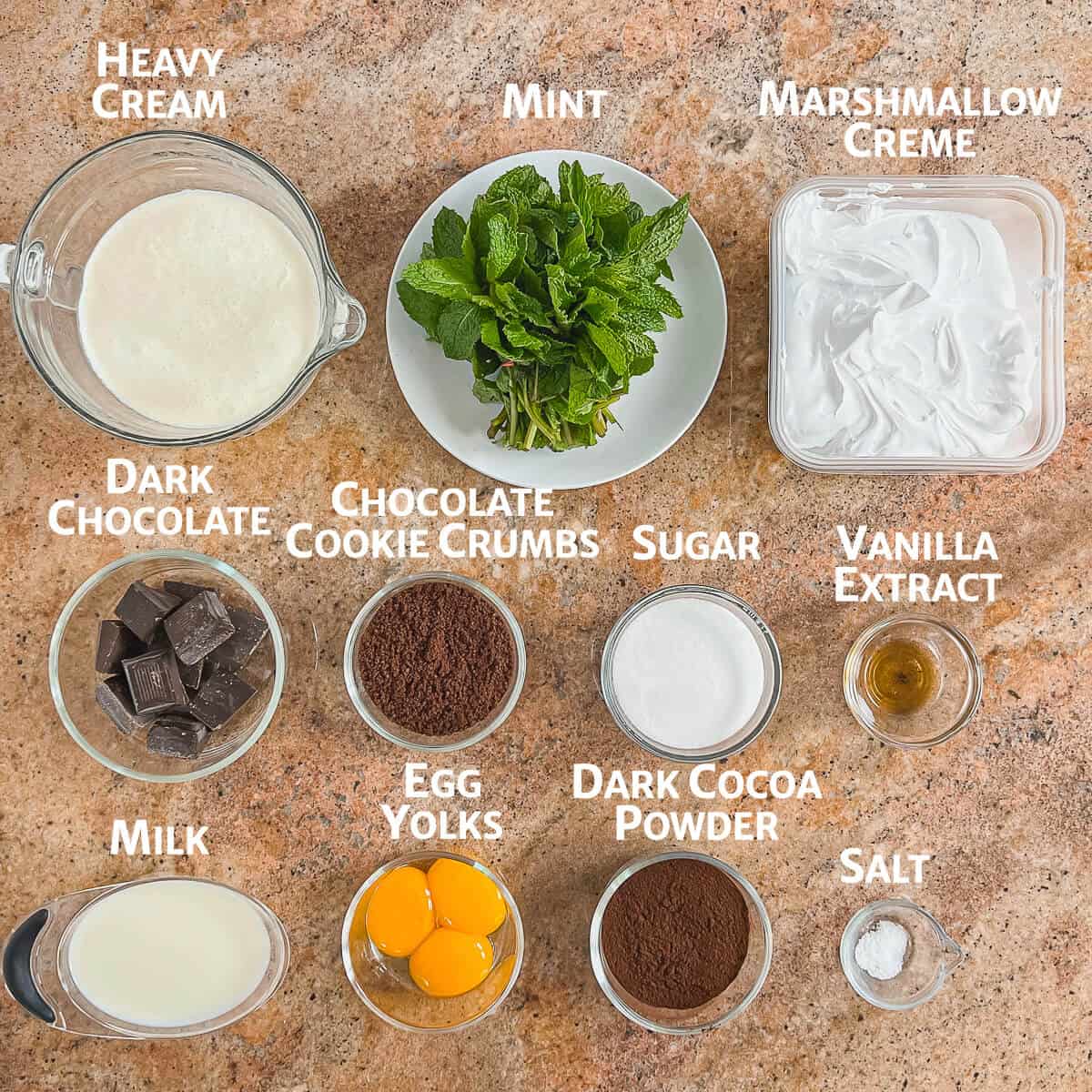 Chocolate Mint Marshmallow Ice Cream ingredients portioned into glass bowls from overhead.
