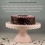 Whole port wine chocolate cake on a pink cake stand Pinterest banner.