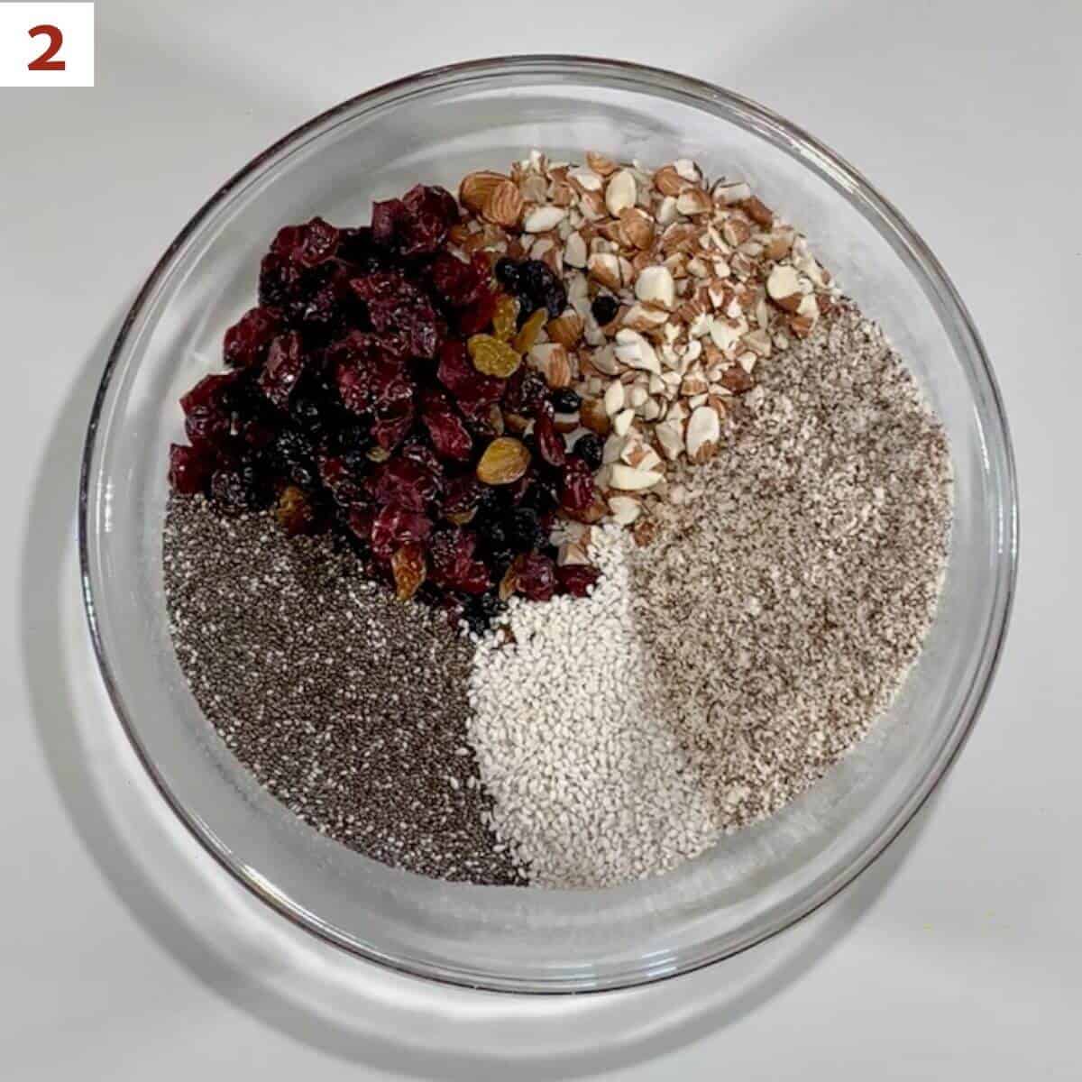 Mixing nuts, fruit, & grains for granola.