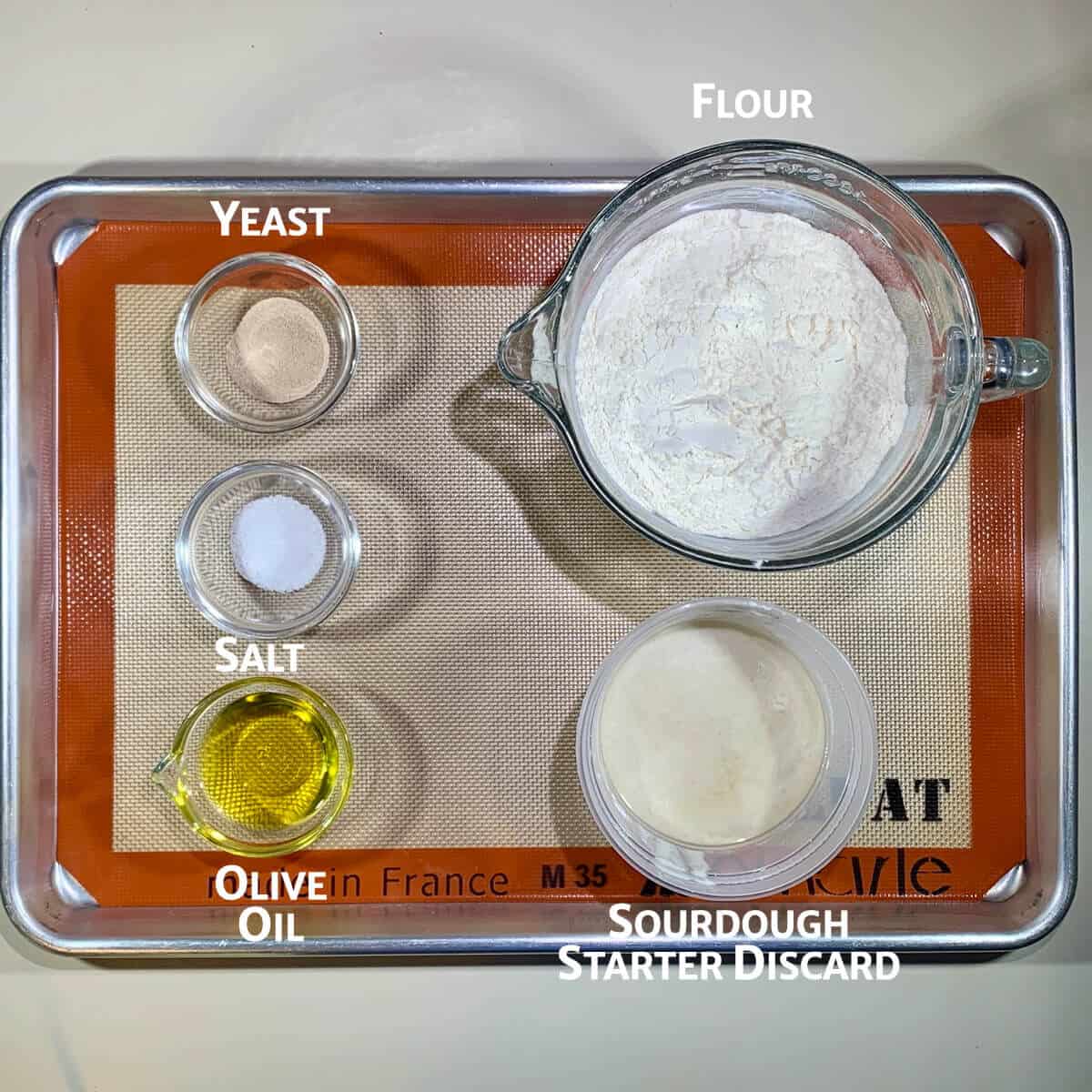 Sourdough Pizza ingredients on tray from overhead.