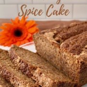 Sourdough Spice Cake sliced on glass plate with pumpkins Pinterest banner.