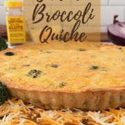 Chicken Broccoli Quiche on a gold base with cheese, seasonings, & red onion Pinterest banner.