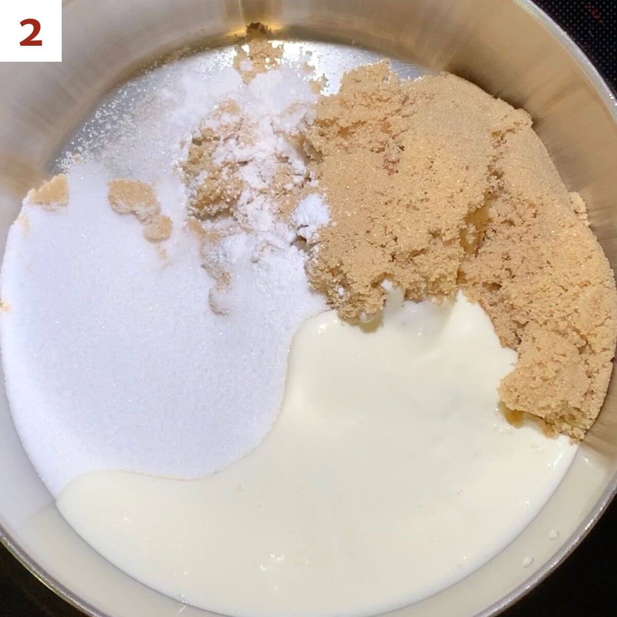 Sugar, brown sugar, salt, heavy cream, and cream of tartar in a heavy saucepan from overhead.