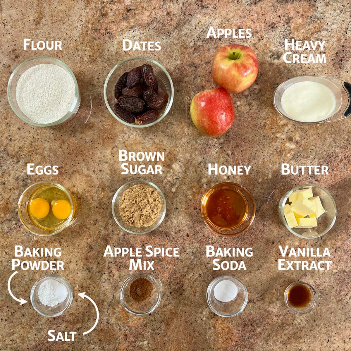 Ingredients for sticky toffee apple pudding portioned into glass bowls.