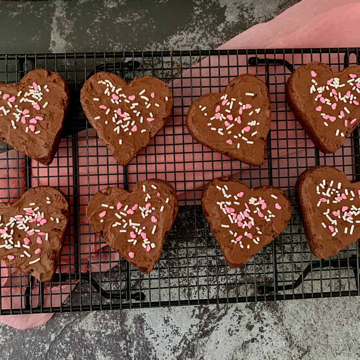 Heart shaped Fudge Brownies on cooling rack from overhead.