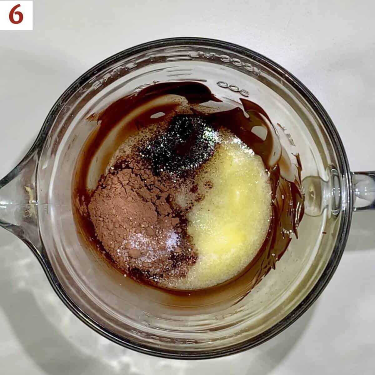 Making fudge filling in a glass bowl.