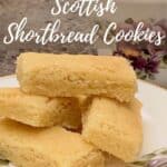 Scottish shortbread on white china plate with teacup Pinterest banner.