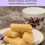 Scottish shortbread on a white china plate with teacup Pinterest banner.