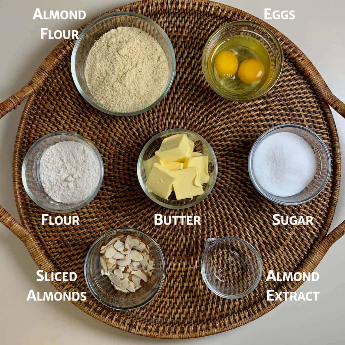 Almond Frangipane ingredients on a wooden tray from overhead.