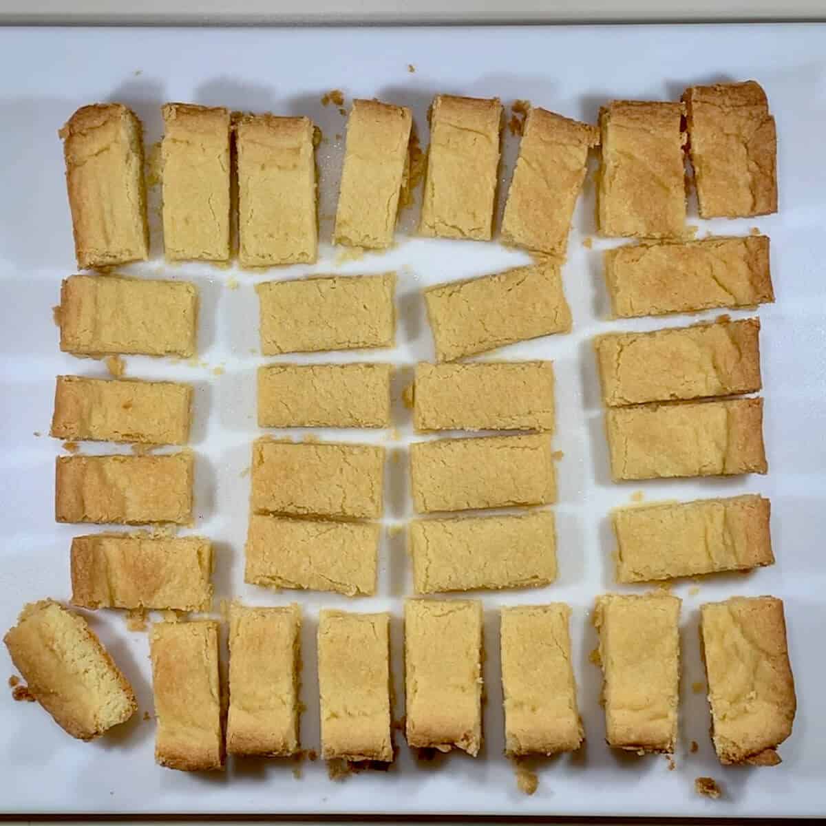 Shortbread bars on a cutting board.