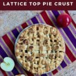 Lattice topped apple pie on a purple striped towel with cut apples from overhead Pinterest banner.