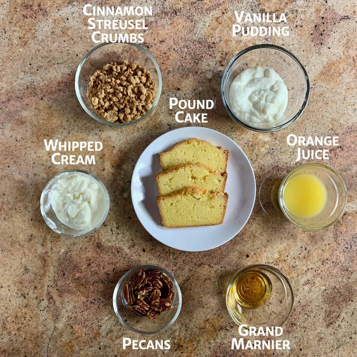 Orange Cinnamon Trifle ingredients portioned in glass bowls with pound cake on a white plate.