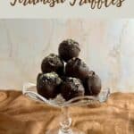 Tiramisu truffles stacked on a glass stand Pinterest banner.