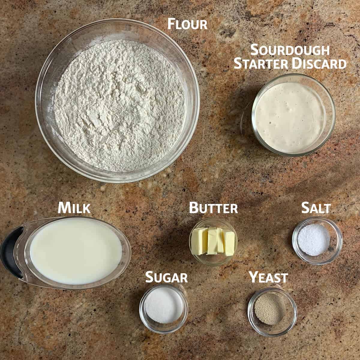 Sourdough English Muffin ingredients portioned in glass bowls from overhead.