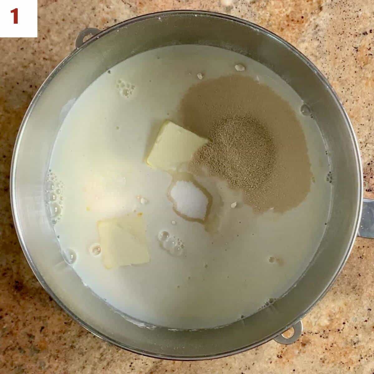 Sourdough discard English muffin ingredients in a bowl from overhead.