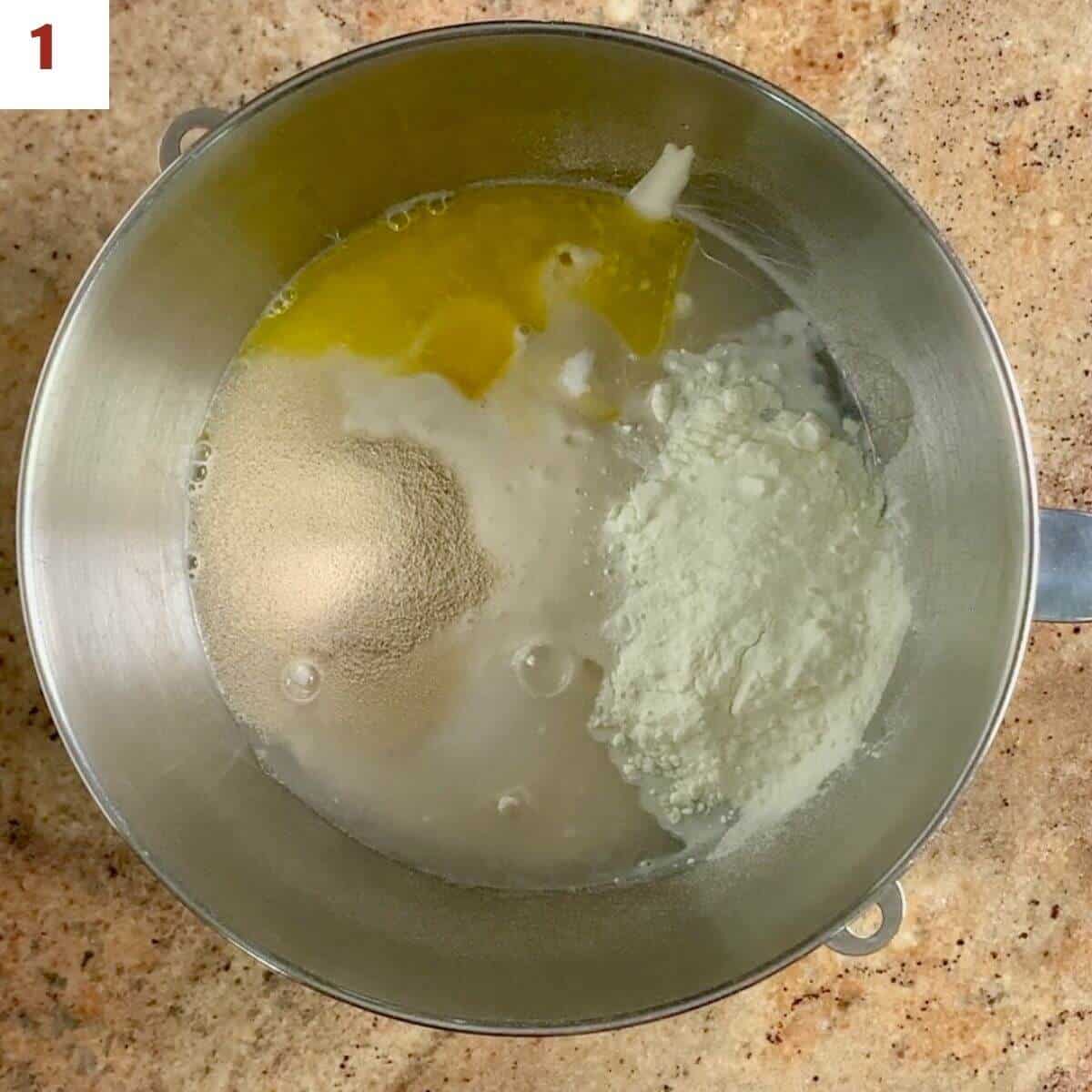 Sourdough pretzels ingredients in a mixing bowl from overhead.