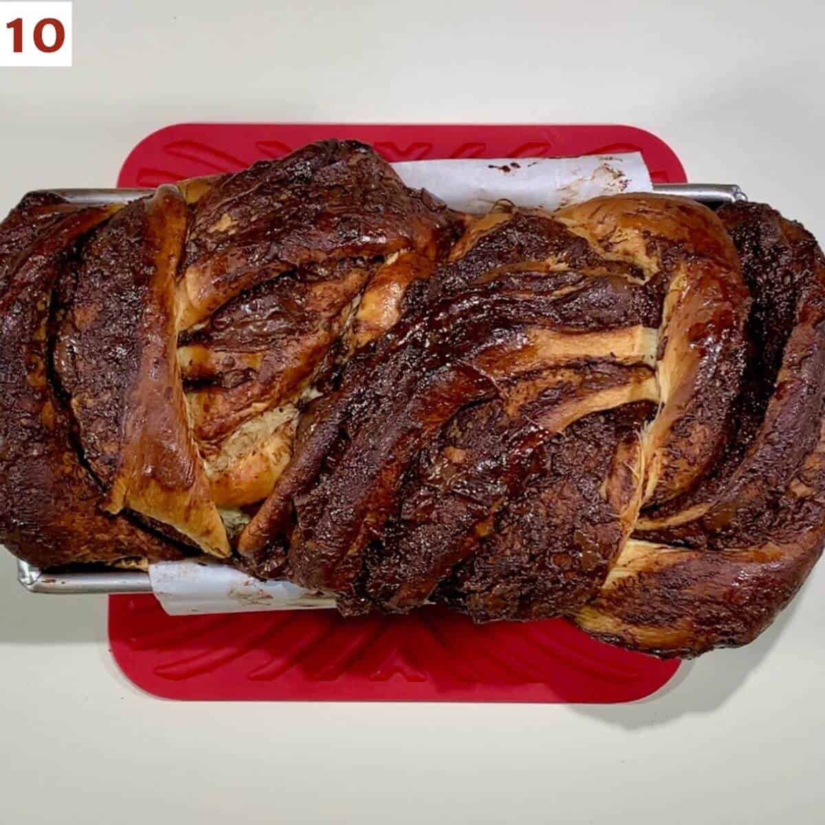 Baked Chocolate Fudge Babka loaf in the pan.