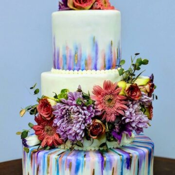 Wedding cake decorated with flowers.